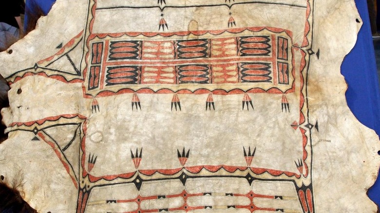 red and black painted buffalo robe