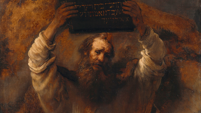 painting Moses holding the Ten Commandments
