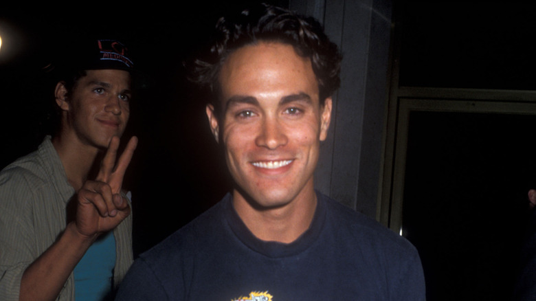 Brandon Lee smiling for a photo