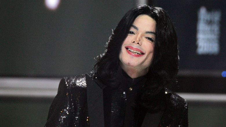Michael Jackson smiling at an event