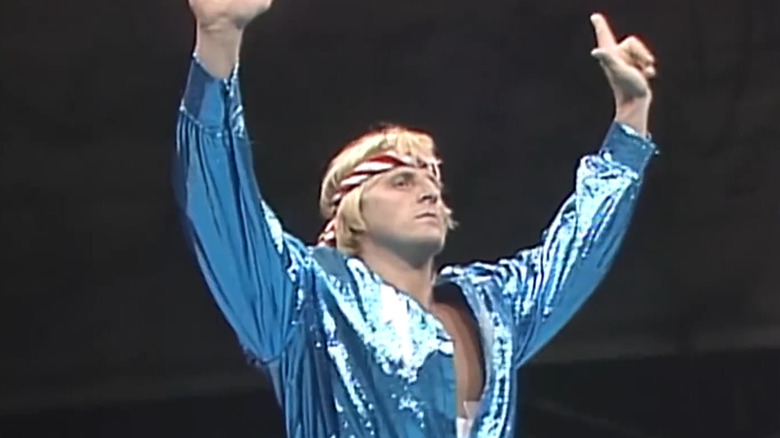 Owen Hart posing in the ring