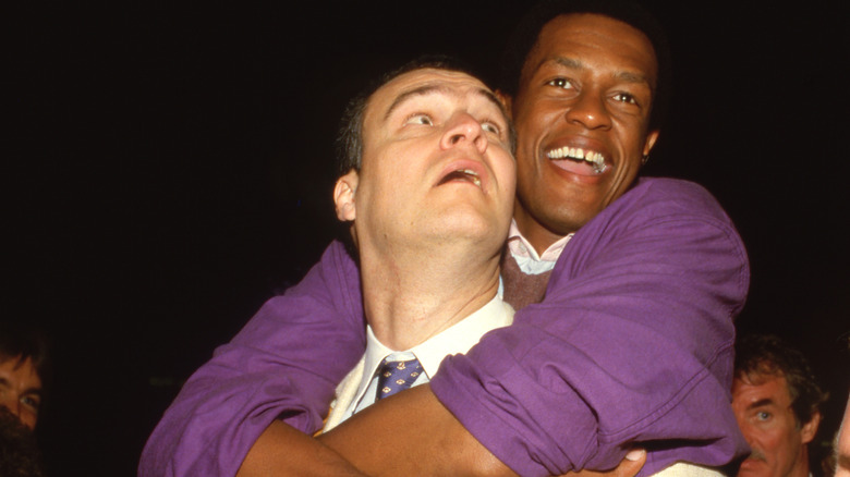 Kevin Peter Hall hugging Richard Moll