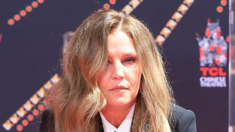 Lisa Marie Presley looking sad at event