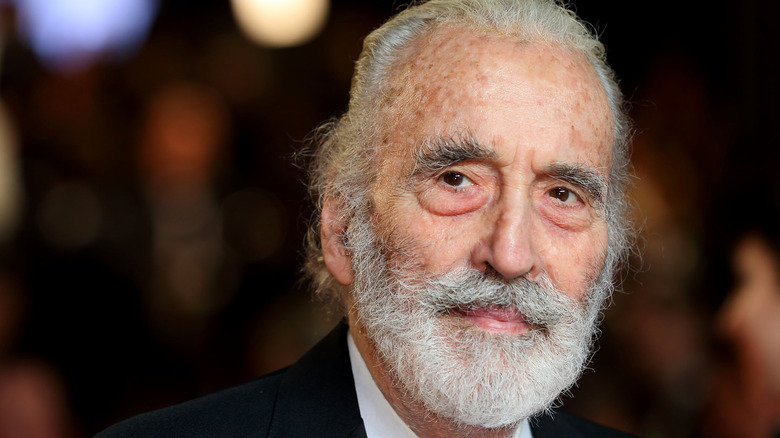 Christopher Lee smiles behind beard