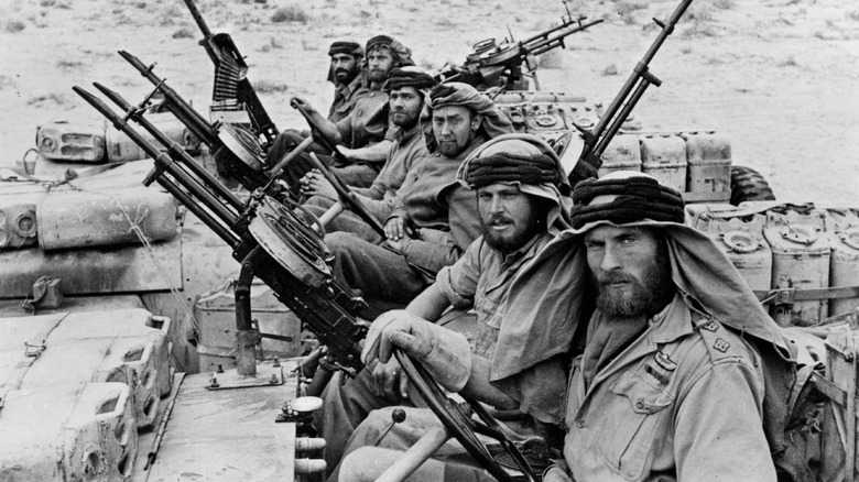 SAS men look up from guns