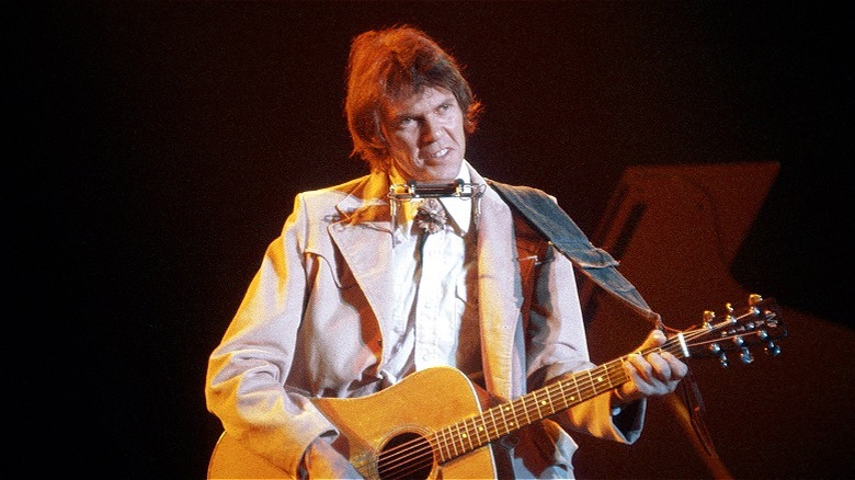 Neil Young onstage in the early 1970s
