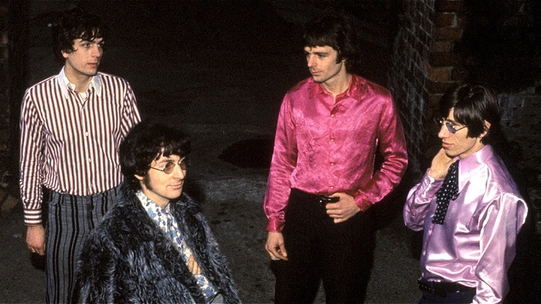 Pink Floyd standing scattered
