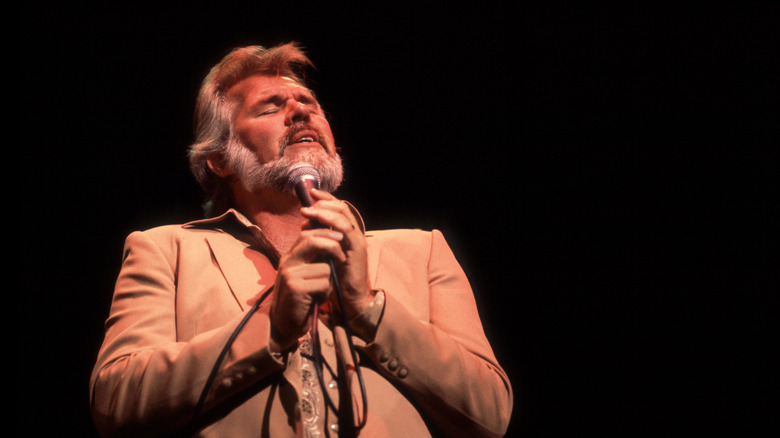 Kenny Rogers performs in 1981 with eyes closed