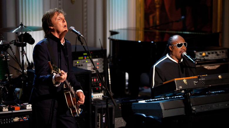 Paul McCartney and Stevie Wonder performing