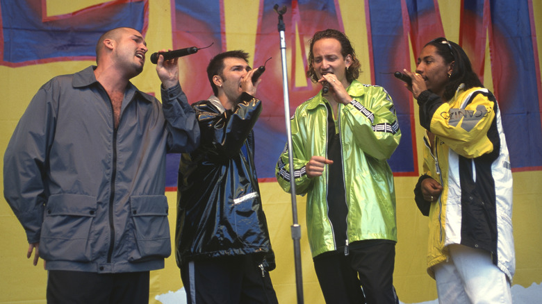 Color me Badd performing in different vinyl looking jackets in 1996
