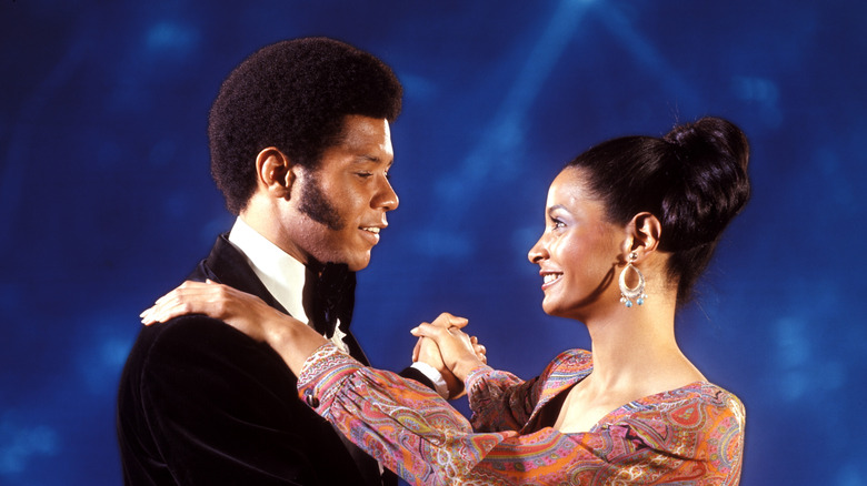 Microphone on stage illuminated by stage lights