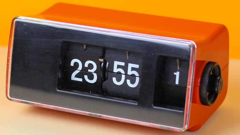 A retro alarm clock with flip dials