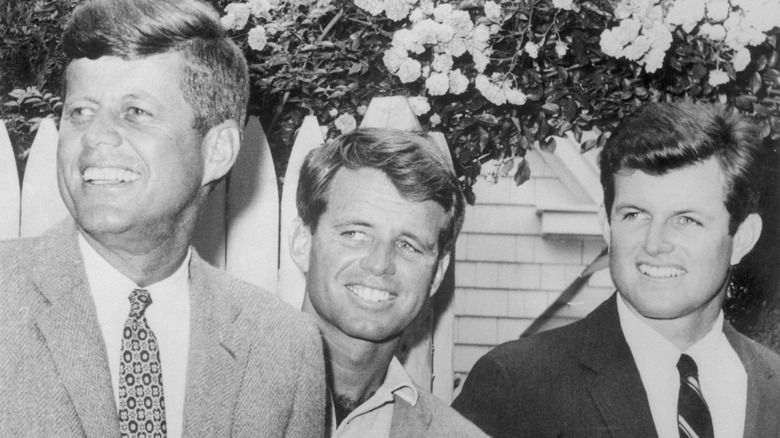 John, Robert Ted Kennedy smile
