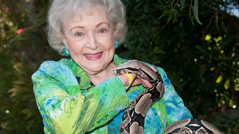 betty white holding. snake