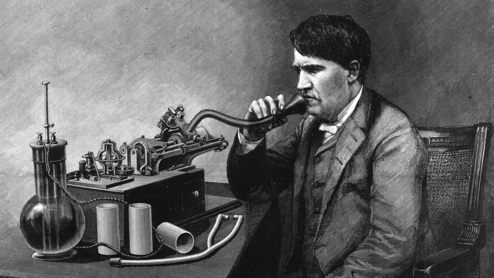 Thomas Edison speaks into apparatus