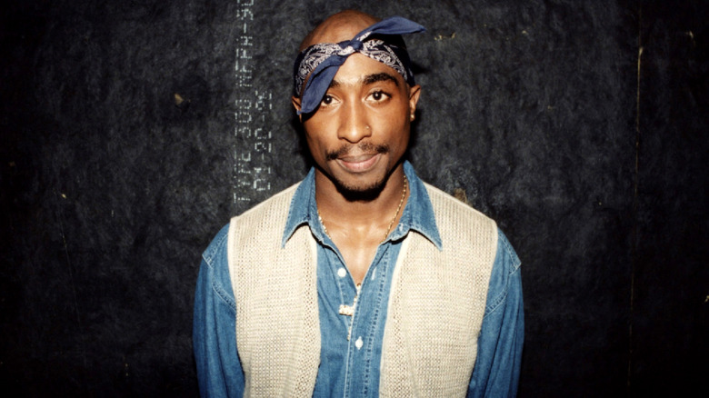 Tupac posing blue bandana