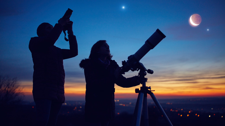 People looking at outer space