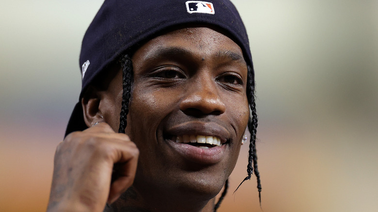 Travis Scott smiling, 2021