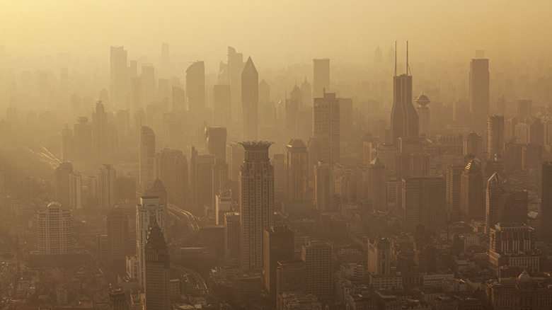 Amber smog over Shanghai skyscrapers