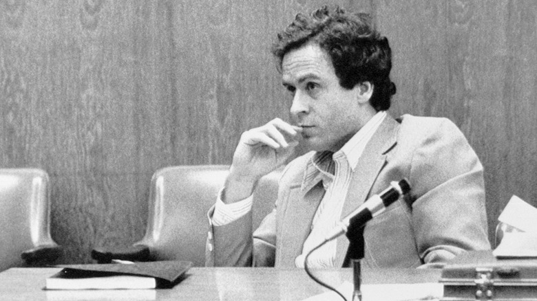 Ted Bundy looks up from stand