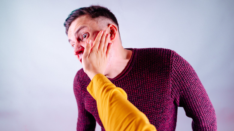 a person being slapped