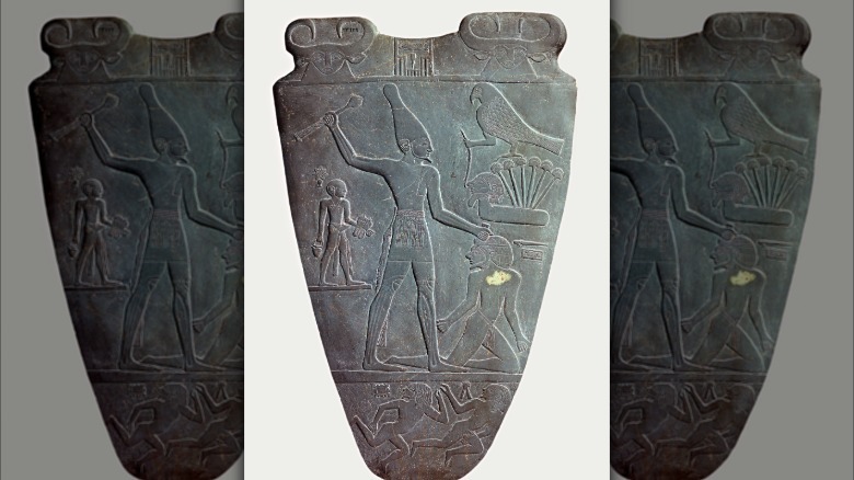 One side of the Narmer Palette showing Narmer holding a mace