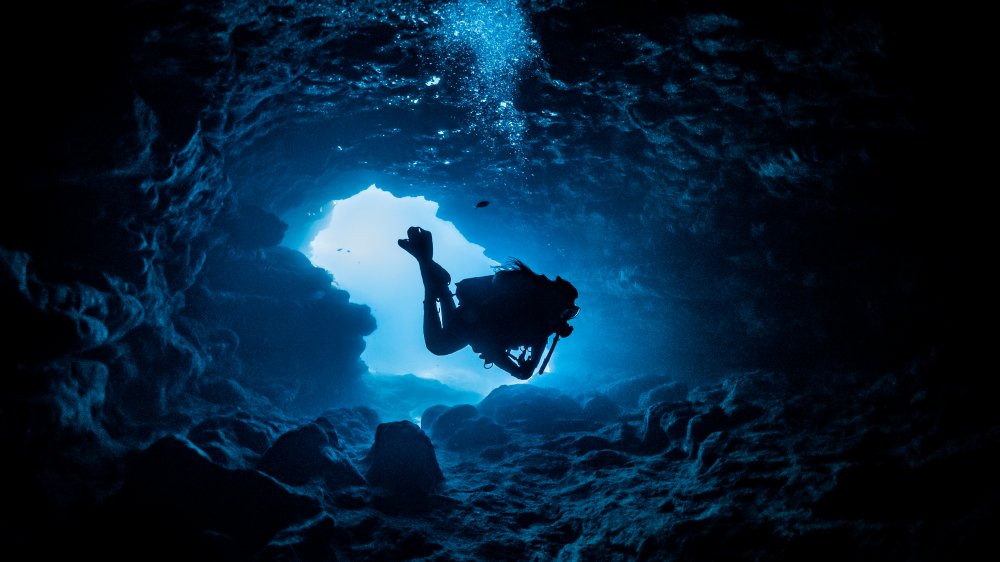 Diver inside underwater cave