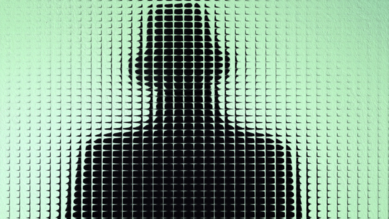 Creepy silhouette behind glass