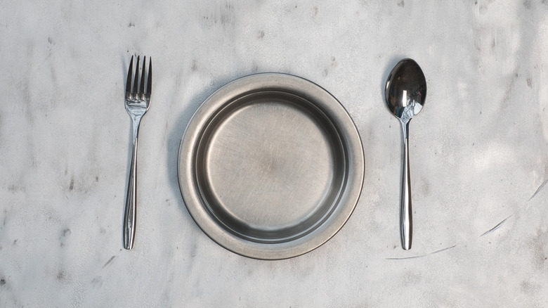 Cutlery on metal table