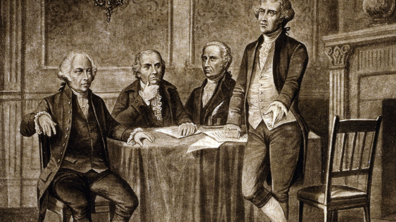 Four men two chairs