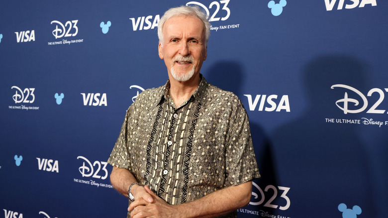 James Cameron smiling on the red carpet