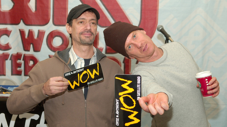 Opie and Anthony with stickers at promotional event