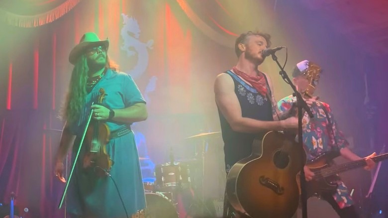 Vandoliers performing on stage in drag