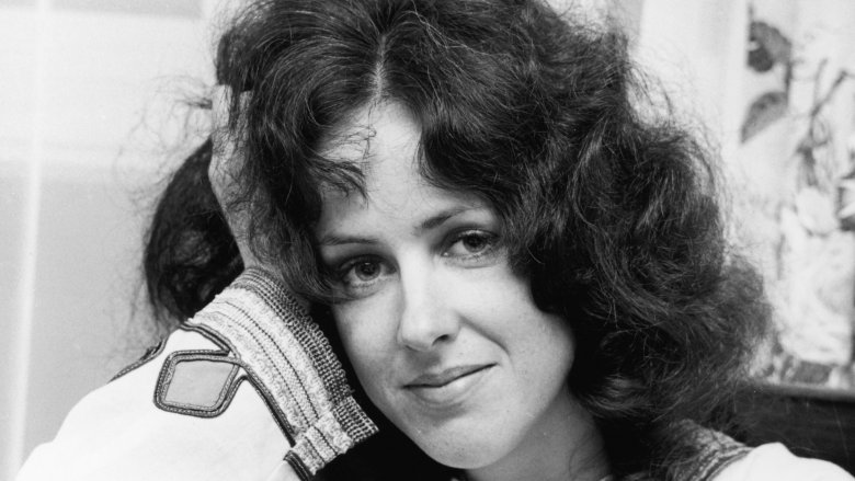 Grace Slick smiling head leaning on hand