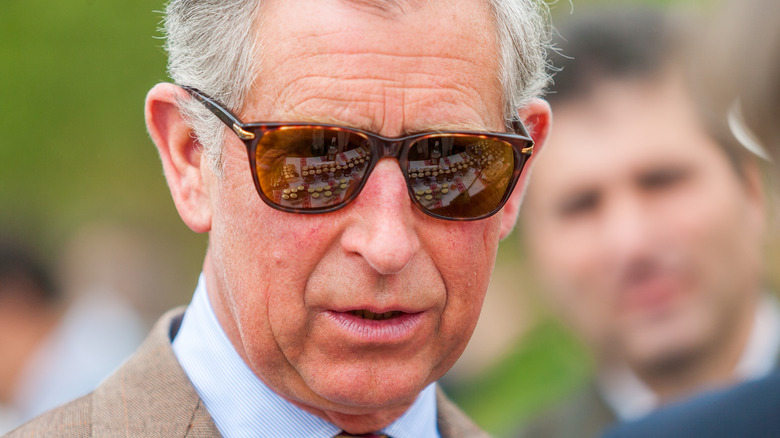 Charles, Prince of Wales visits an exhibition of traditional culinary products home made