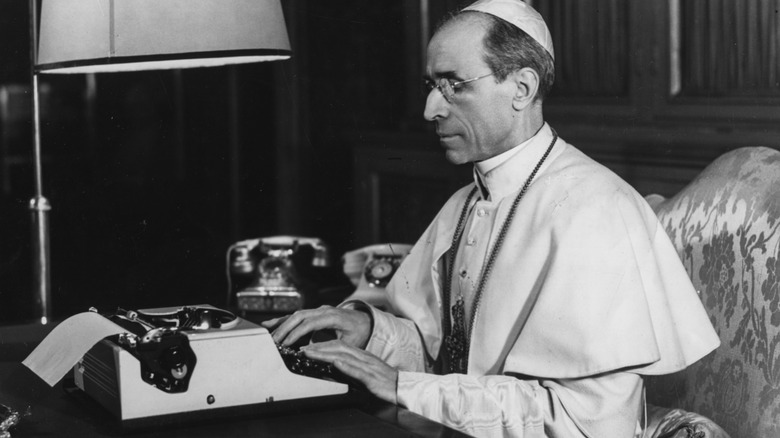 pope puis xii working on a typewriter