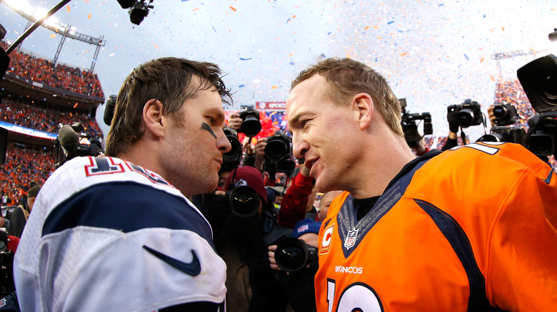 Brady Manning staring at each other