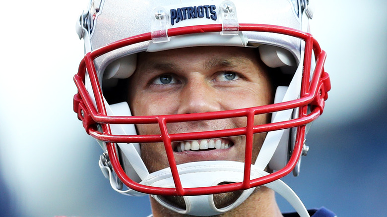 Tom Brady in Patriots helmet