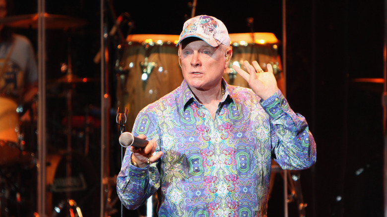 The Beach Boys' Mike Love performing on stage in 2011