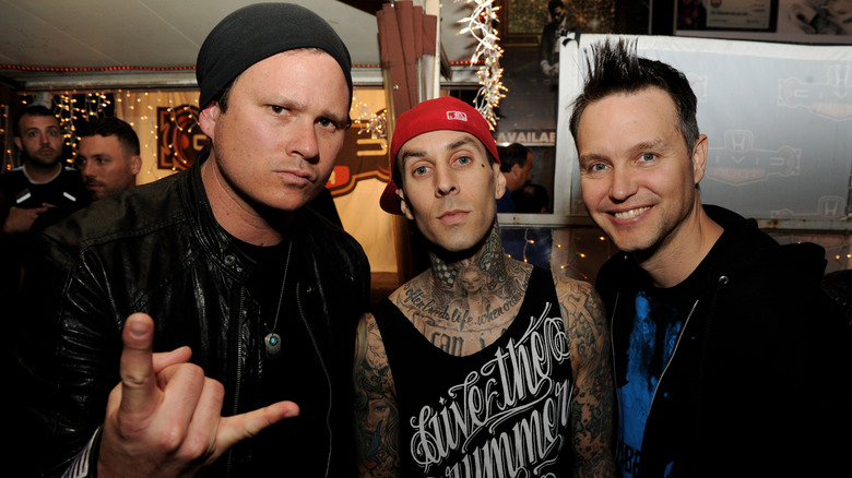 Blink-182 posing for a photo in 2011