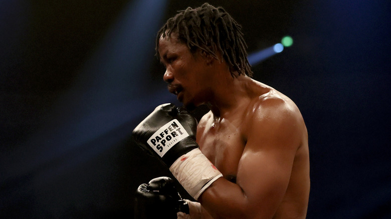 kassim ouma shirtless boxing gloves