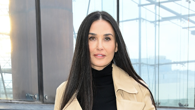 Demi Moore straight hair beige coat