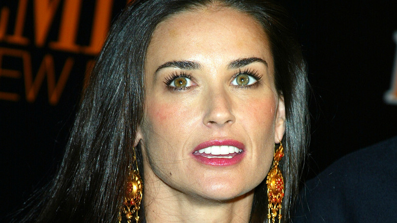 Demi Moore dark hair red lipstick