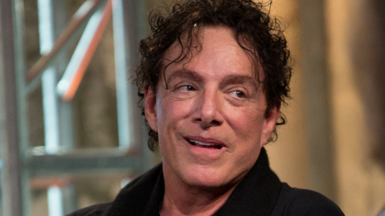 Neal Schon smirking