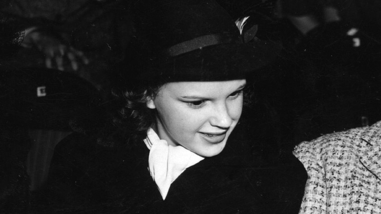 Young Judy Garland looking down