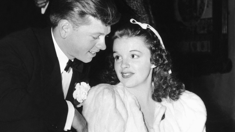 Mickey Rooney and Judy Garland, both smiling