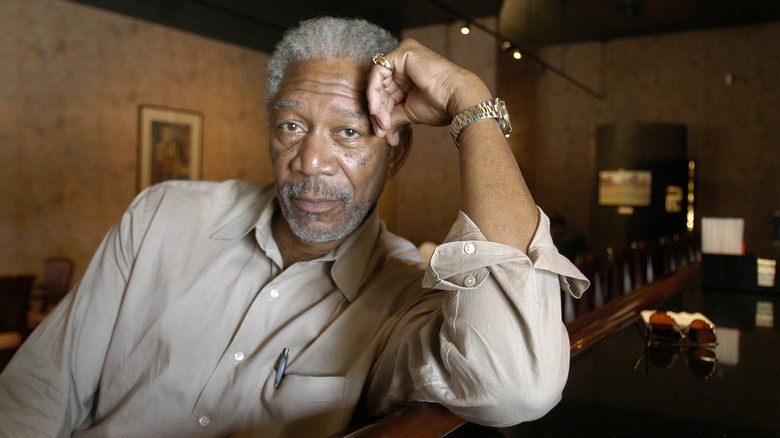 Morgan Freeman leaning on counter