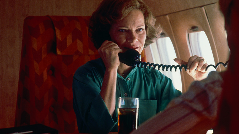Rosalynn Carter on the phone in a plane