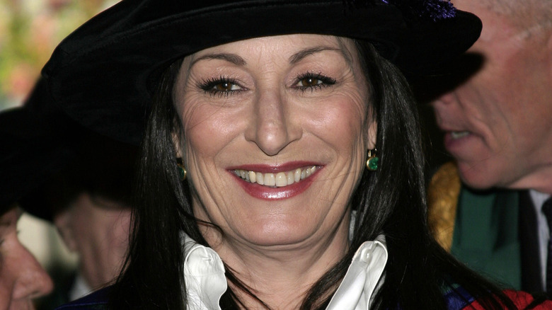 Anjelica Huston grinning