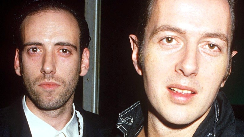 Mick Jones and Joe Strummer staring at camera